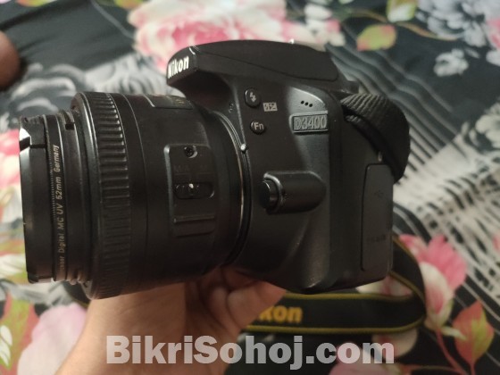 Nikon D3400 with 35mm prime lense